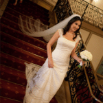 Bride on Staircase / Photography by Katie DiSimone