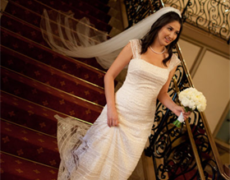 Bride on Staircase / Photography by Katie DiSimone